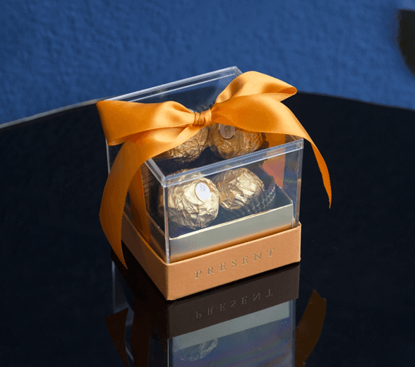 Side view of clear candy box